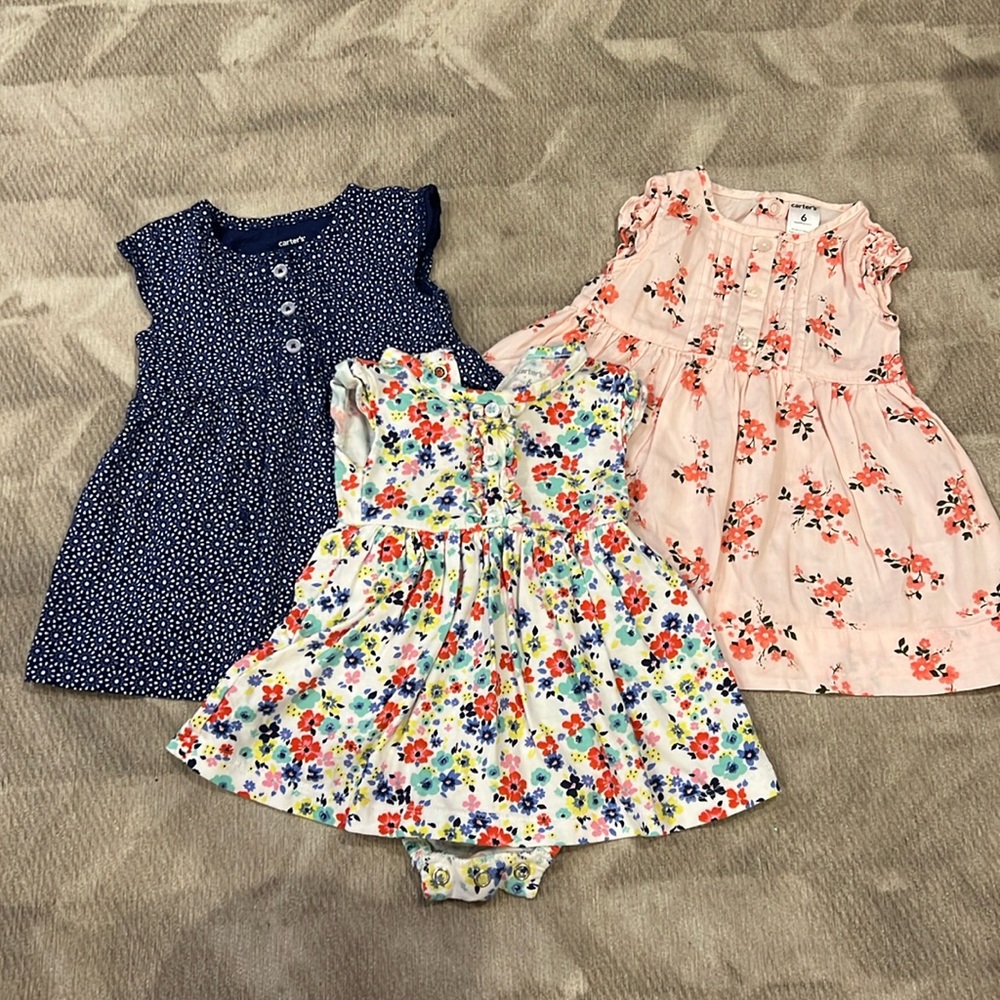 Lot of 3 Carter’s dresses. Blue, Pink, Multi Floral